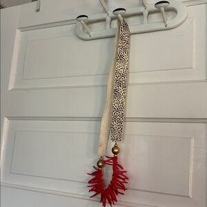 Red and Gold Beaded Necklace with Patterned Leather Strap